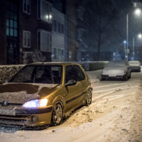 Peugeot 106 in de sneeuw met USLights