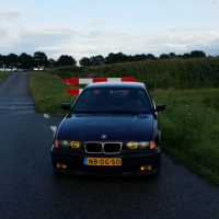 BMW e36 met USLights en gele koplampen