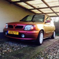 Nissan Micra oliepaint met USLights